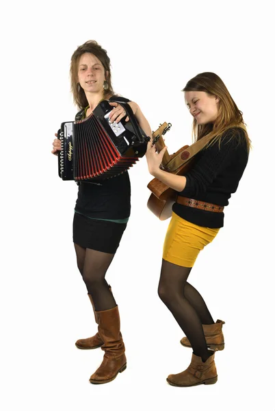 Twee meisjes afspelen van muziek — Stockfoto