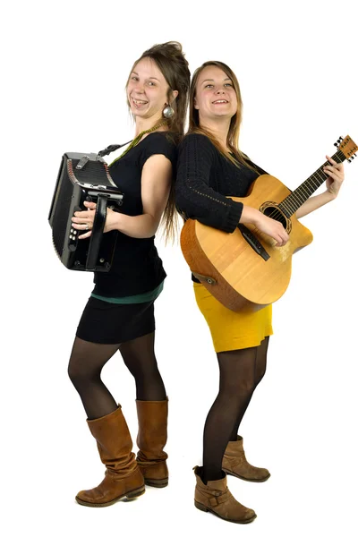 Две девушки играют музыку — стоковое фото