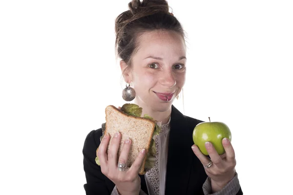 Choix difficile entre gâteau et pomme — Photo