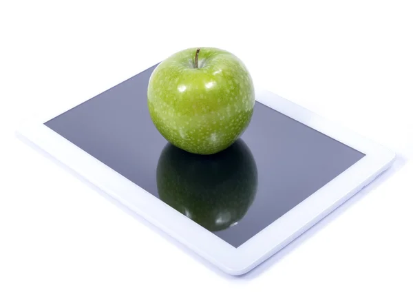 Pomme verte et tablette numérique — Photo