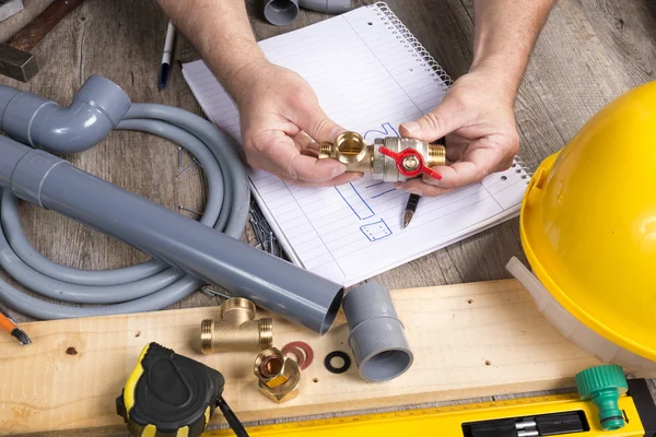 Plumbing do-it-yourself with different tools — Stock Photo, Image