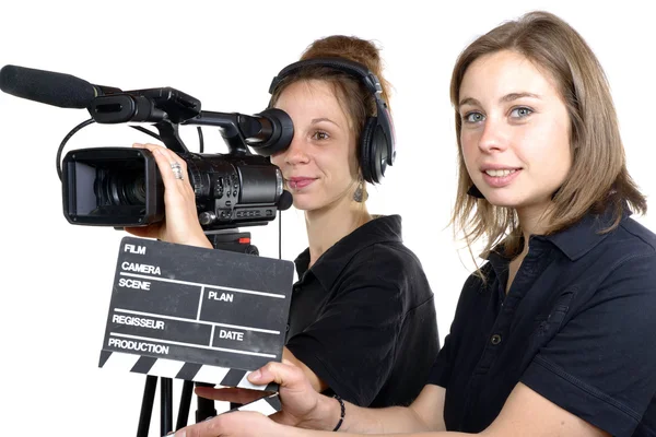 Two young women with a video camera — Stock Photo, Image