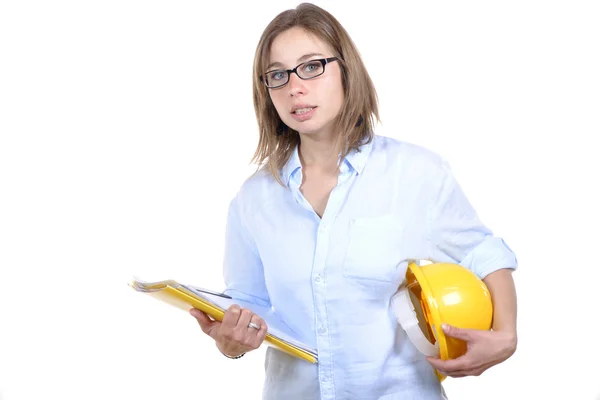 Joven arquitecta con un casco amarillo — Foto de Stock