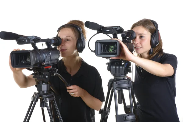 Two young women with  video cameras — Stock Photo, Image