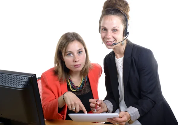 Two young women in office working — Stock Photo, Image