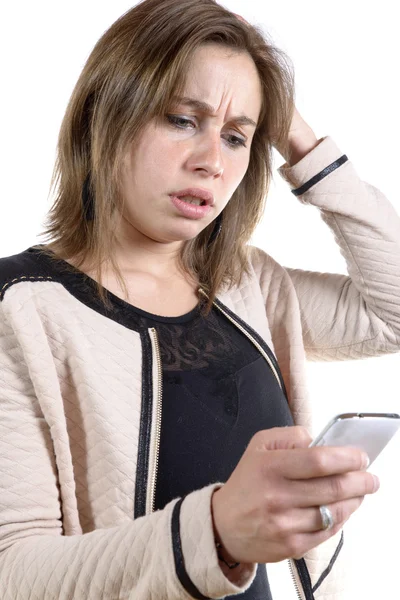 Young woman with a problem on the phone Stock Image