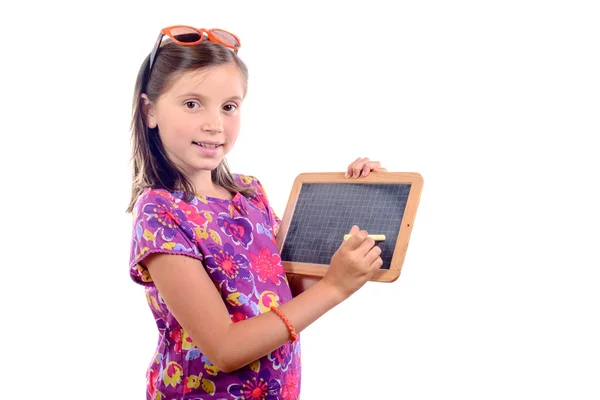 Schoolgirl with a slate — Stock Photo, Image