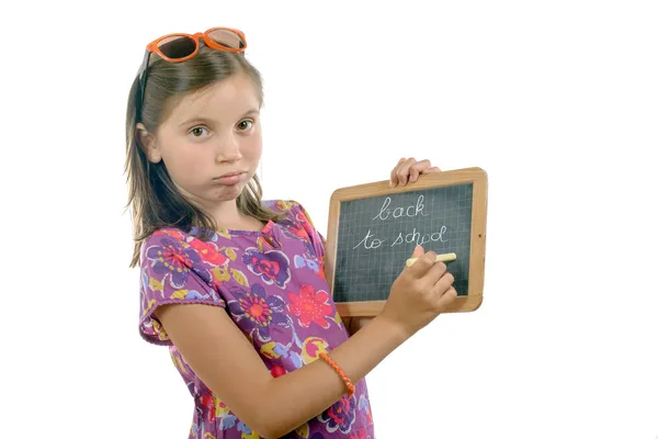 Schoolgirl with a slate — Stock Photo, Image