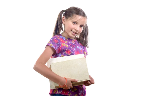 Schülerin mit Bücherstapel — Stockfoto