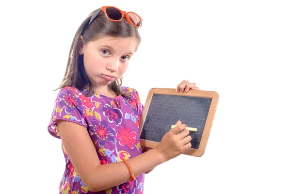 Schoolgirl with a slate — Stock Photo, Image