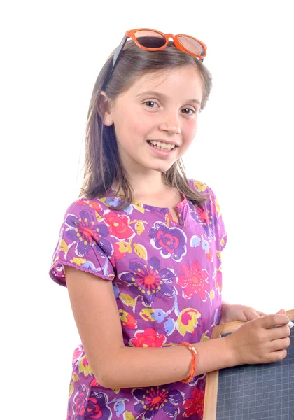 Schoolgirl with a slate — Stock Photo, Image