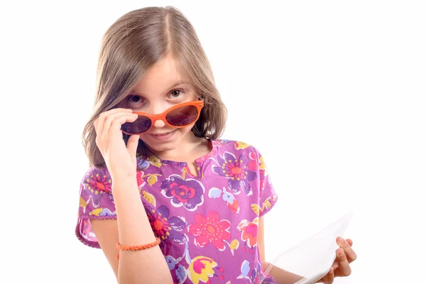 Schoolgirl with a digital tablet — Stock Photo, Image