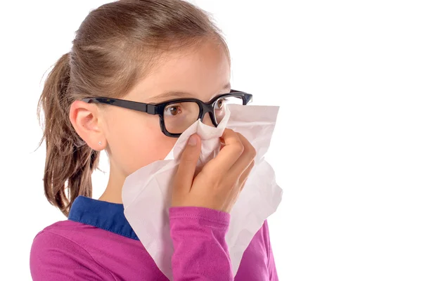 A little schoolgirl has a cold — Stock Photo, Image