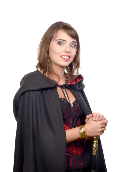 Bonita chica vestida con una capa negra para Halloween —  Fotos de Stock