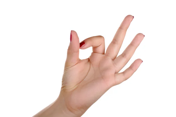 Die Hand einer jungen Frau gibt ein Zeichen — Stockfoto