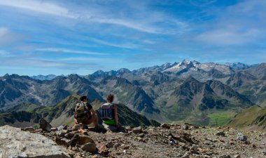two  hikers on the trail of the Pic du Midi de Bigorre in the Pyrenees