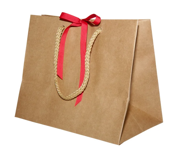 Kraft kağıt hediye çanta ip ile beyaz zemin üzerine kırmızı fiyonklu 003 ele alır.