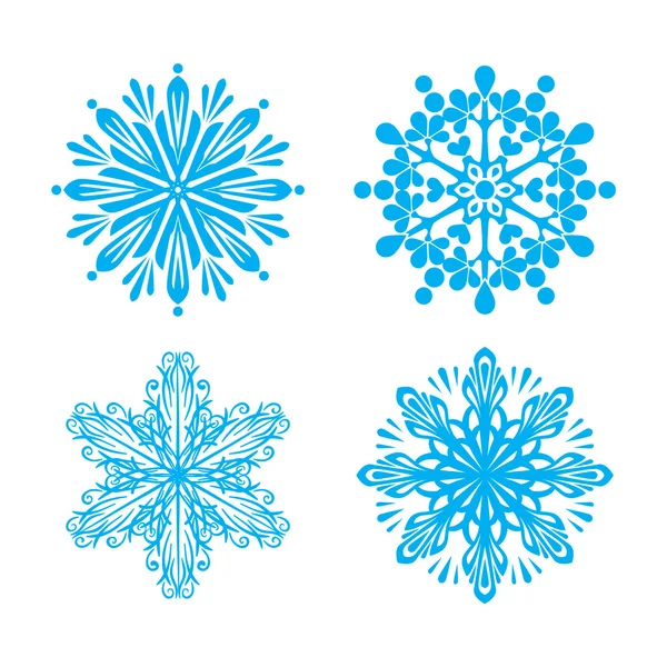 beyaz zemin üzerinde mavi kar taneleri vektör