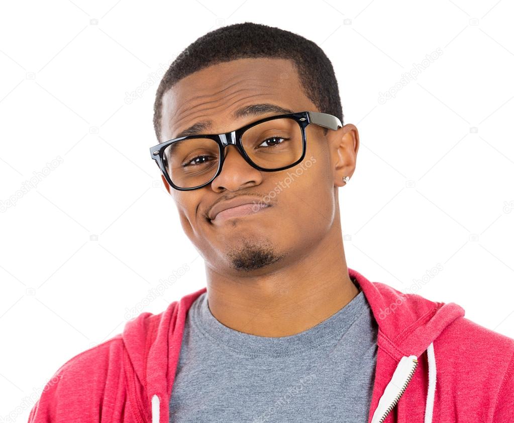 Closeup portrait of handsome cocky guy with big black glasses looking at you camera gesture skeptically