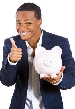 Closeup portrait of rich super excited young successful happy man introducing his friend, the piggy bank clipart