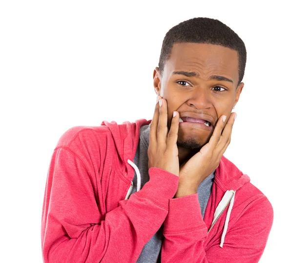 Closeup portrait of young man, looking shocked, scared trying to protect himself in anticipation of an unpleasant situation — Stock Photo, Image