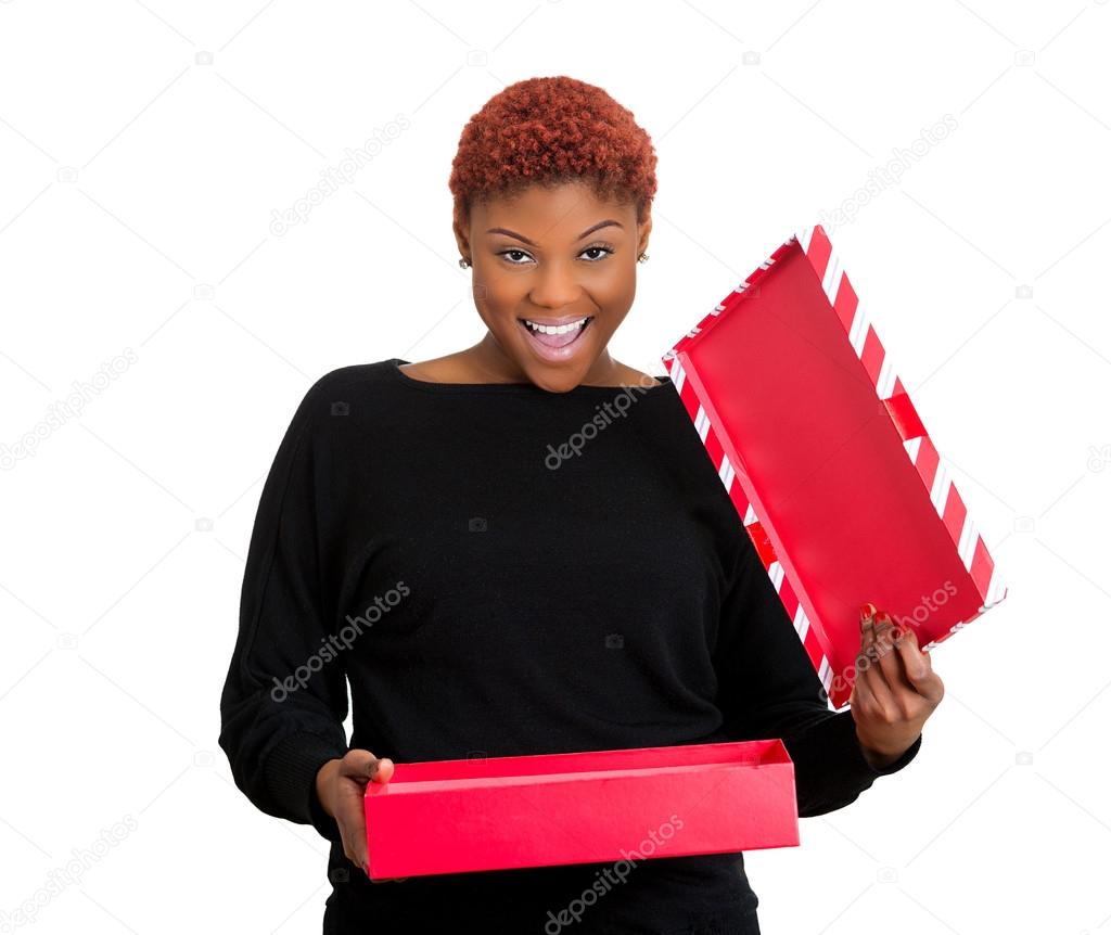 Excited woman opening gift box