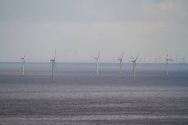 Wind turbines at sea from Llandudno, North Wales, UK.    