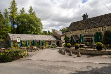 Cockleford, UK, 28 june 202. Charming little Inn and village shop in the Cotwsold, finely decroated with plantd and hand writenn blackboard sings.