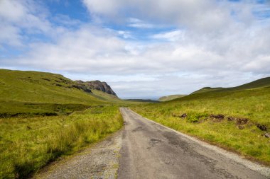 Scottish Highlands typical landscaped and scenery, bright green lawns, roads to nowhere, tranquil lochs. Fairy tale views.