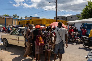 Pedernales, Domininan Republic, 22 august 2022. Touring in the Haitan Market near the border with Haiti, with goods, foods and ladies browsing, selling and buying.