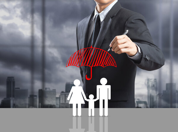 Business man drawing insurance concept