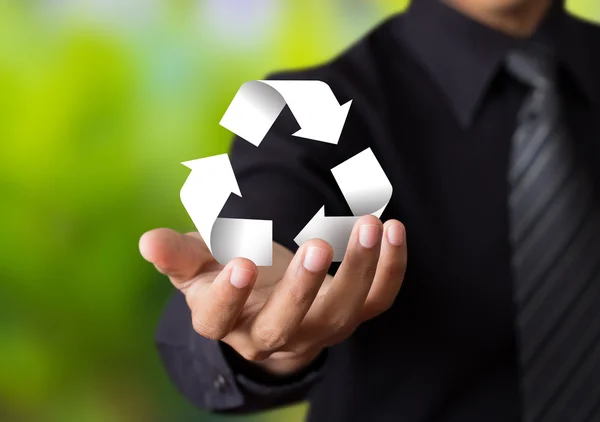 Cartel de reciclaje de papel en mano de hombre de negocios — Foto de Stock