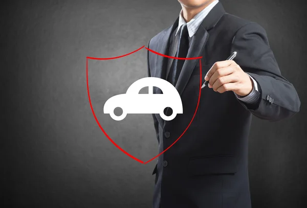 Business man drawing shield protecting auto car, insurance concept — Stock Photo, Image