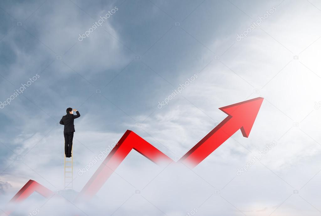 Businessman climbing on a ladder over mountain looking growth chart