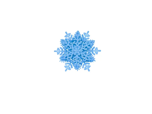 白い背景に青い雪片 クリスマスのお正月飾り — ストック写真