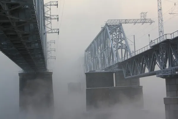 Railway bridge through the river — Stock Photo, Image