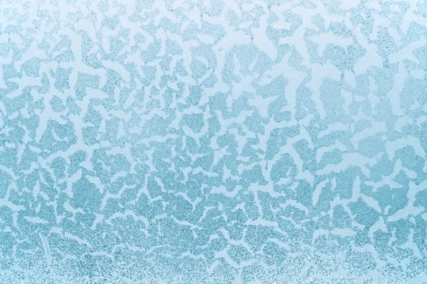 Patterns on glass in the frosty winter day — Stock Photo, Image