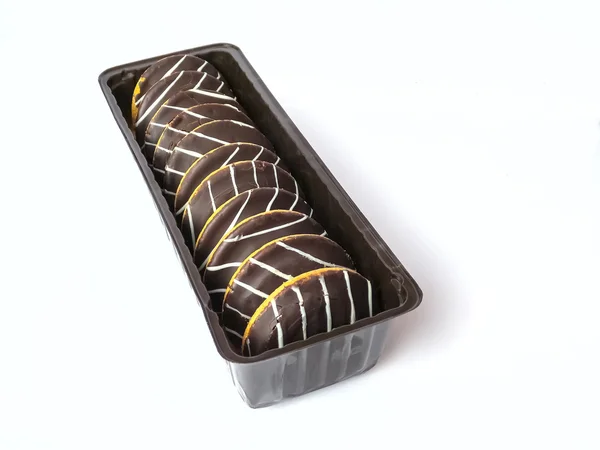 Biscoitos deliciosos com esmalte de chocolate — Fotografia de Stock