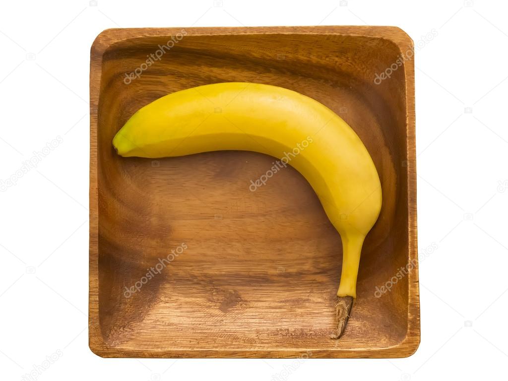 Banana in a wooden bowl.