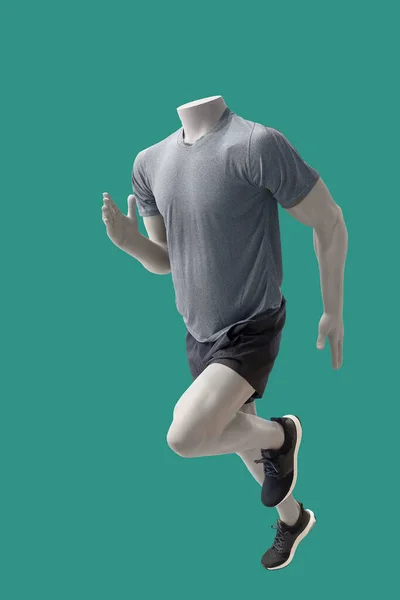 Hardlopen Afbeelding Van Een Mannelijke Etalagepoppen Dragen Sportkleding Geïsoleerd Een — Stockfoto