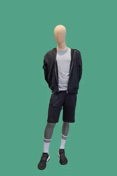 Yeşil Arka Planda Izole Edilmiş Spor Giyimli Bir Erkek Vitrin — Stok fotoğraf