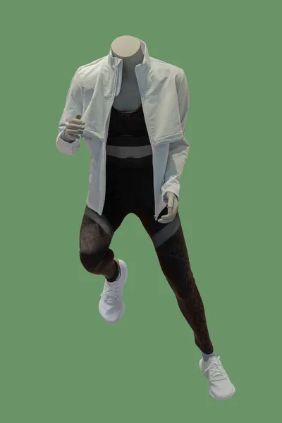 Image Running Male Display Mannequin Wearing Sportswear Isolated Green Background —  Fotos de Stock