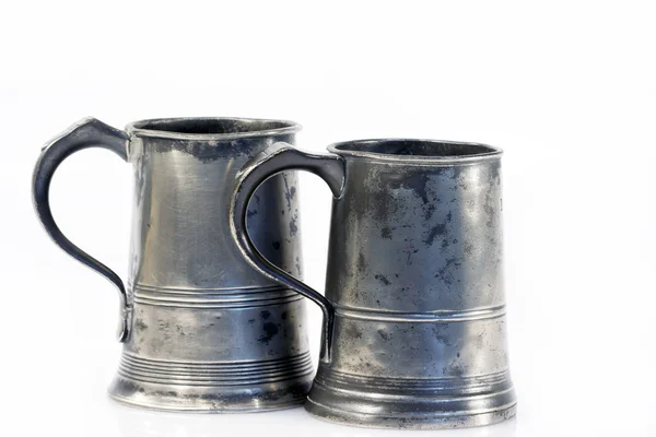 Two old quart pewter drinking jars isolated on white — Stock Photo, Image
