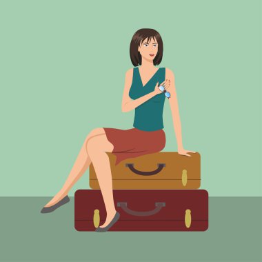 bavul üzerinde oturan kız resmi