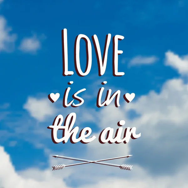 Vector blurred illustration with clouds, blue sky and text "Love is in the air" — Stock Vector