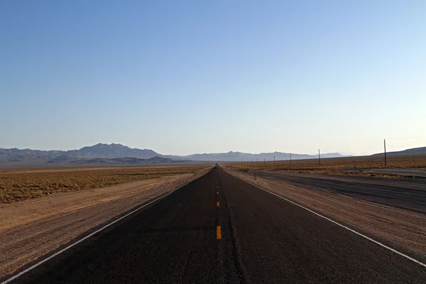 Road in a desert — Stock Photo, Image