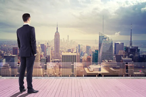 Businessman looking at city — Stock Image Businessman looking at city Stock Picture