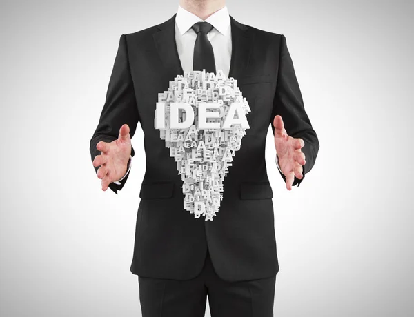 Businessman holding  idea — Stock Photo, Image