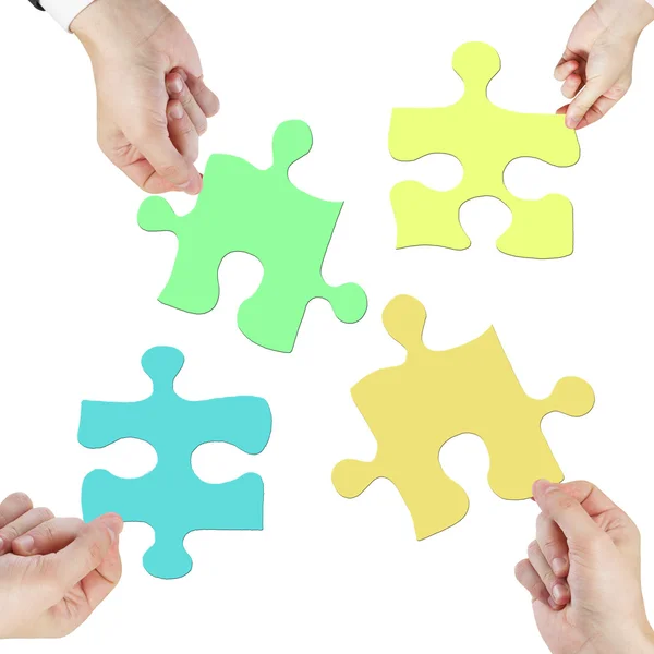 Hands holding puzzle — Stock Photo, Image