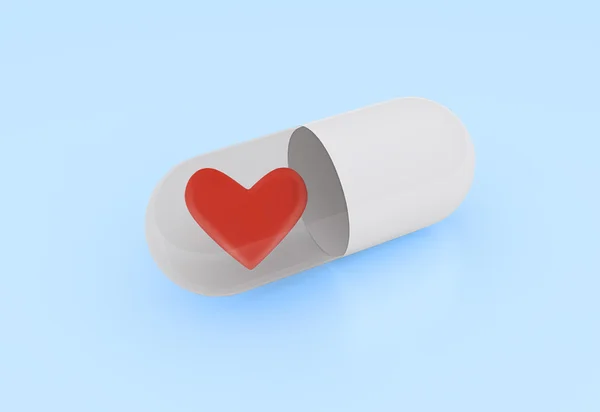 Pills with heart symbol — Stock fotografie